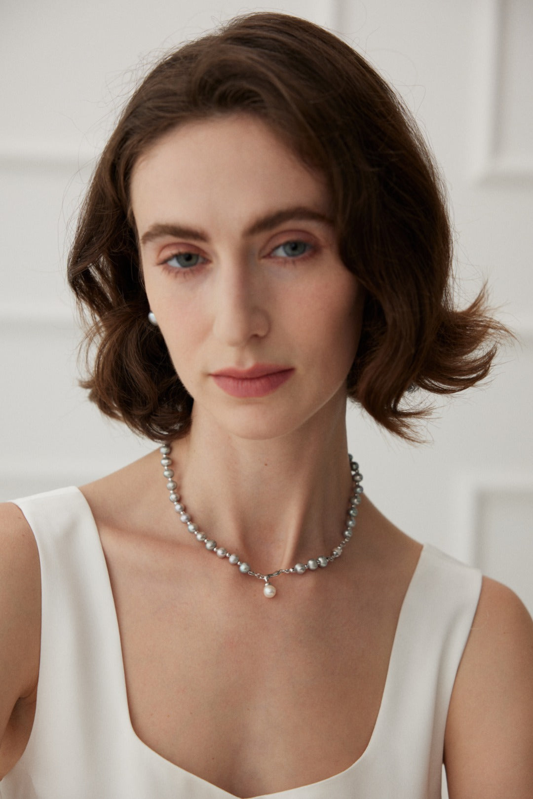 NO.9 The Simplicity of a Layered Pearl Necklace with a Delicate Pendant