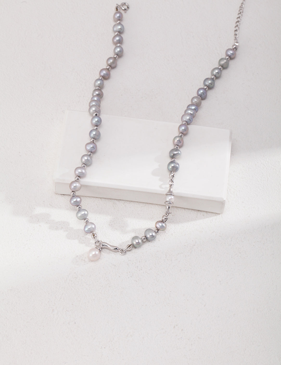 NO.9 The Simplicity of a Layered Pearl Necklace with a Delicate Pendant