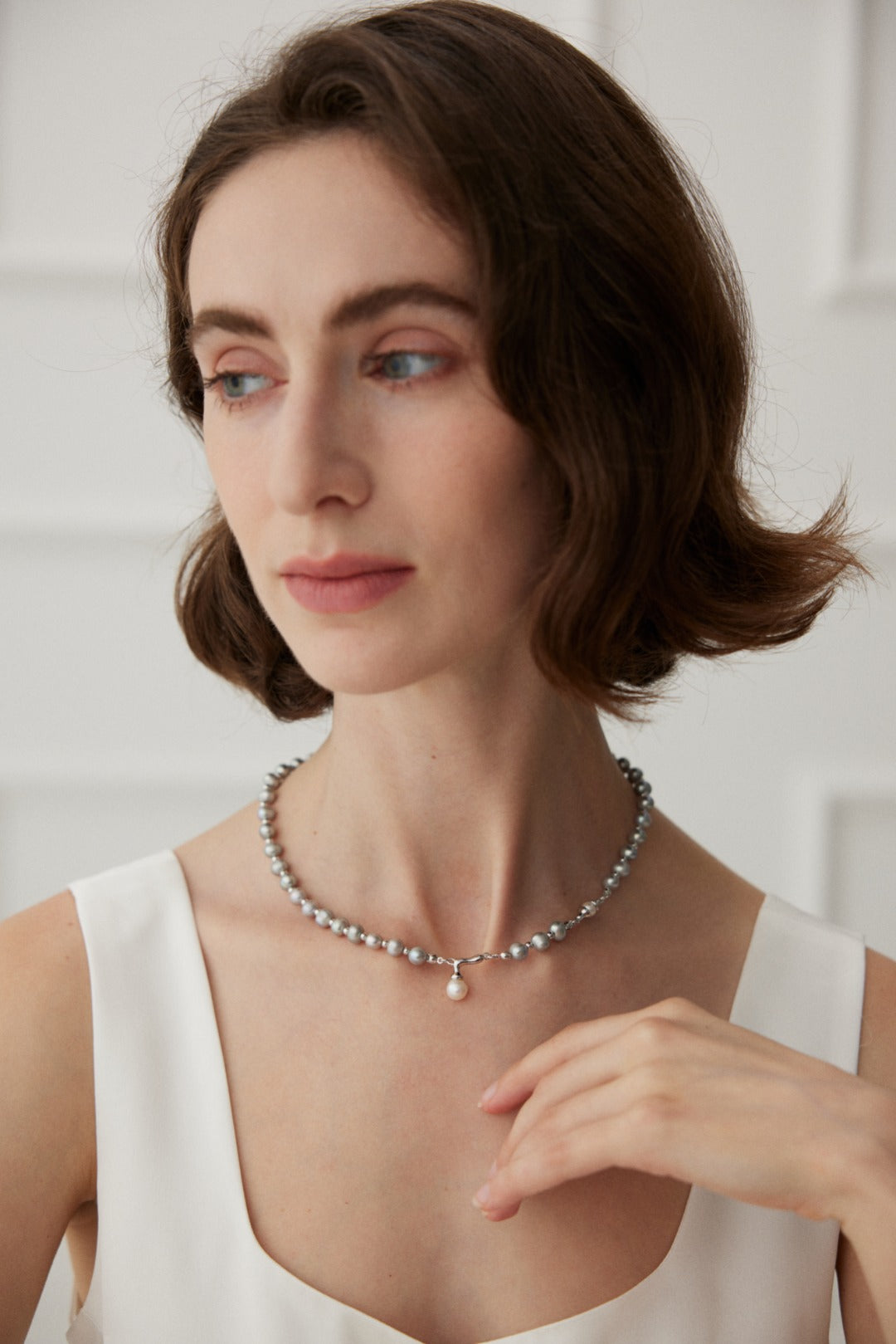 NO.9 The Simplicity of a Layered Pearl Necklace with a Delicate Pendant